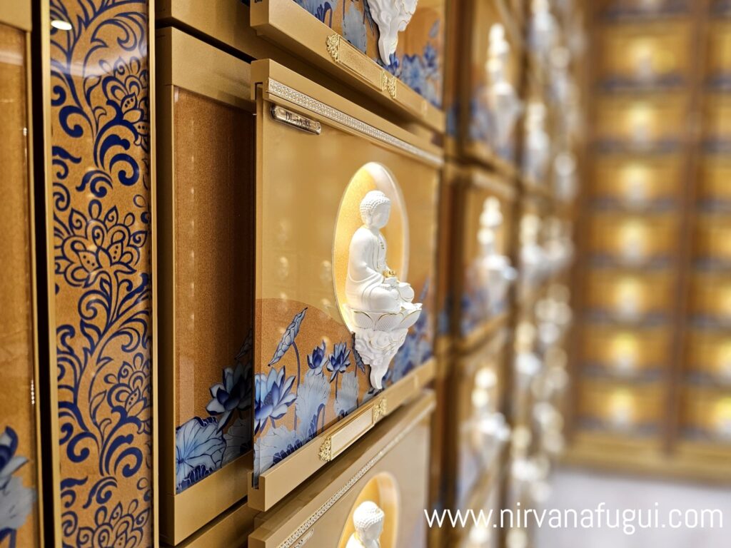 3D Buddha Statue is mounted at the door panel of every niche